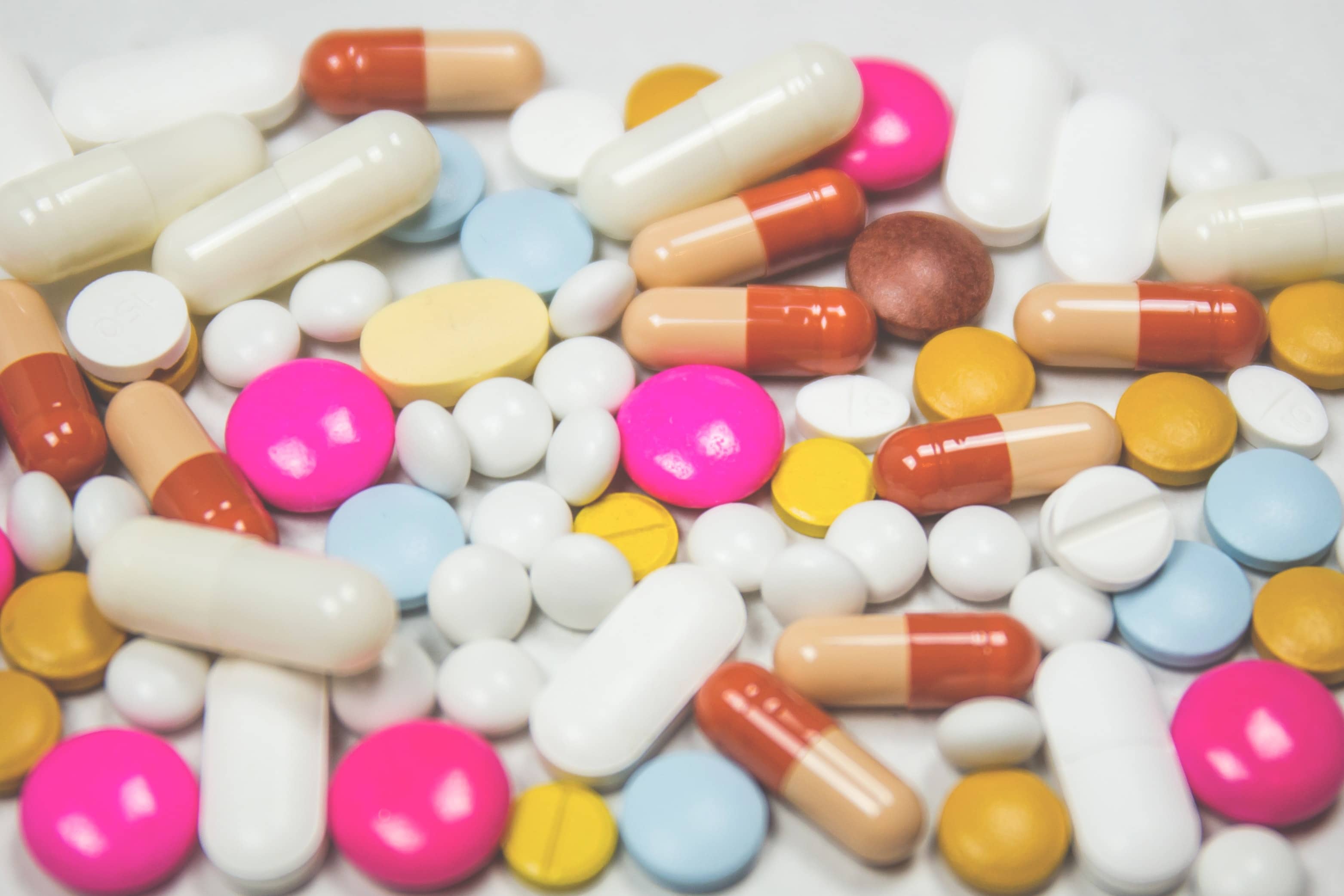 A large number of colorful pills and capsules